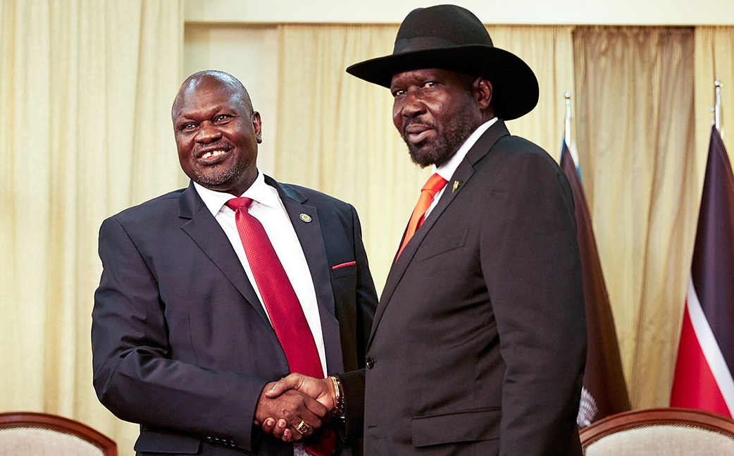 South Sudan's leaders shake hands