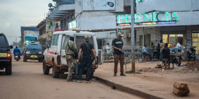 Wagner mercenaries loading groceries into an ambulance in Bangui in September